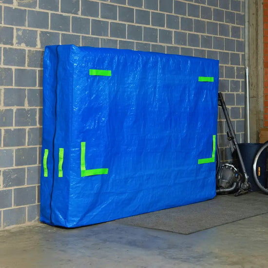 TROVERR heavy-duty mattress storage bag to protect the mattress in a garage from dirt, dust and bugs